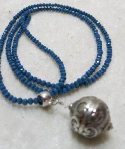 necklace blue long silver pendant laying