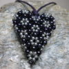 pendant heart purple grey colors threaded with leather tape front view